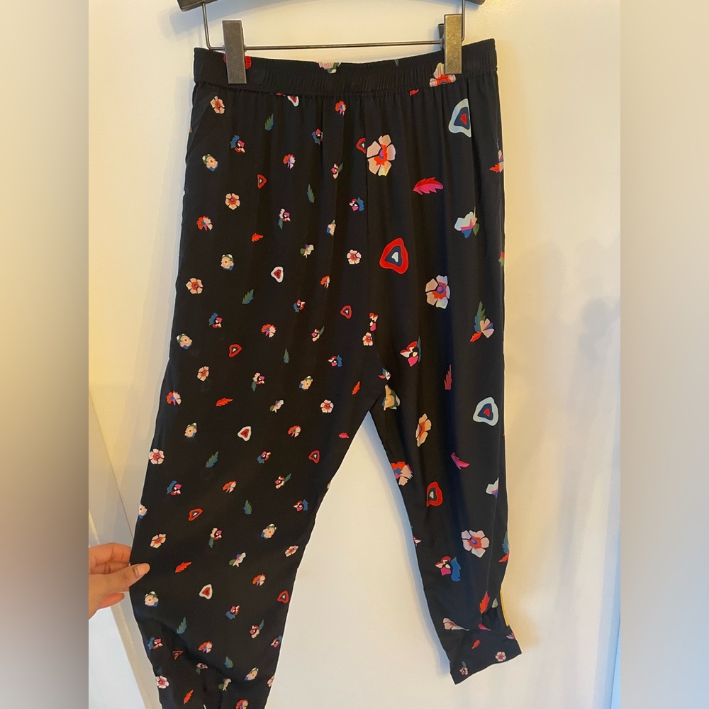 Black joggers with floral design